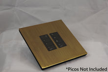 Load image into Gallery viewer, Vision 8-Gang Grid Faceplate for 2 Lutron Pico Controls, Layout: 0110 with black Frame - Antique Brass (Metal Plated)